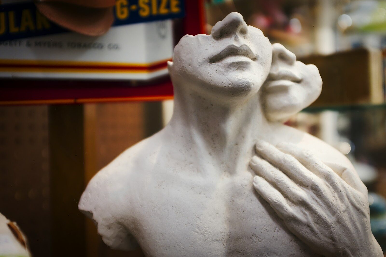 a white statue of a person